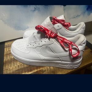 Nike White Sneakers with Red Accents